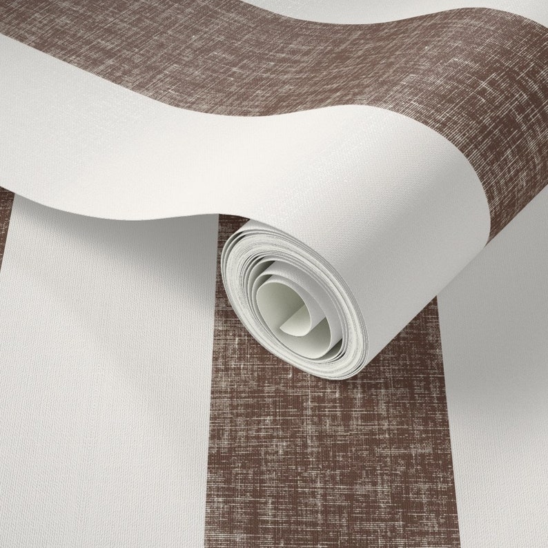 May include: A roll of brown and white striped wallpaper with a textured linen look.