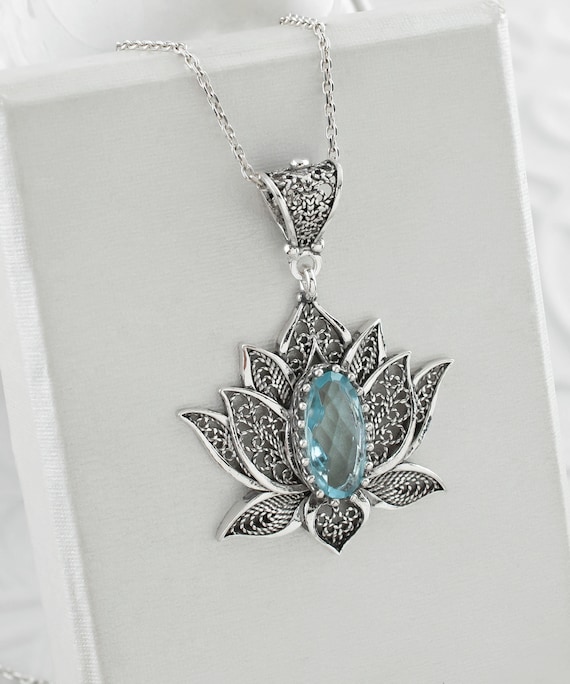 Blue and White Filigree Flower Crystal Medallion Necklace Blue and White Filigree Flower Crystal Medallion Necklace