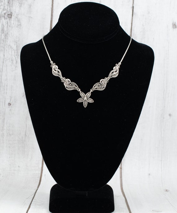 [PRIMAUTE] 韓国☆925 Silver☆Black mid flower Necklace Amazon.com: Beixiter 925 Sterling Silver Tiny Daisy Flower