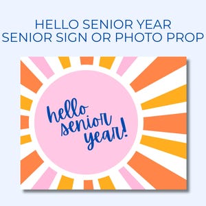 May include: A rectangular sign featuring a sunburst pattern in alternating orange, white, and pink rays. A large pink circle sits in the center with the dark blue text "hello senior year!" written in a cursive script. The top text reads "HELLO SENIOR YEAR SENIOR SIGN OR PHOTO PROP".