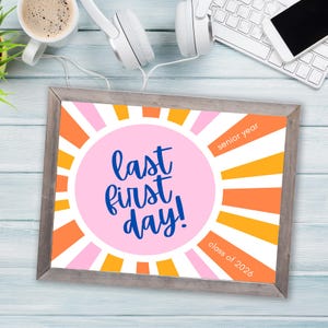Framed Last first day sign or photo prop for the class of 2026 on a desk