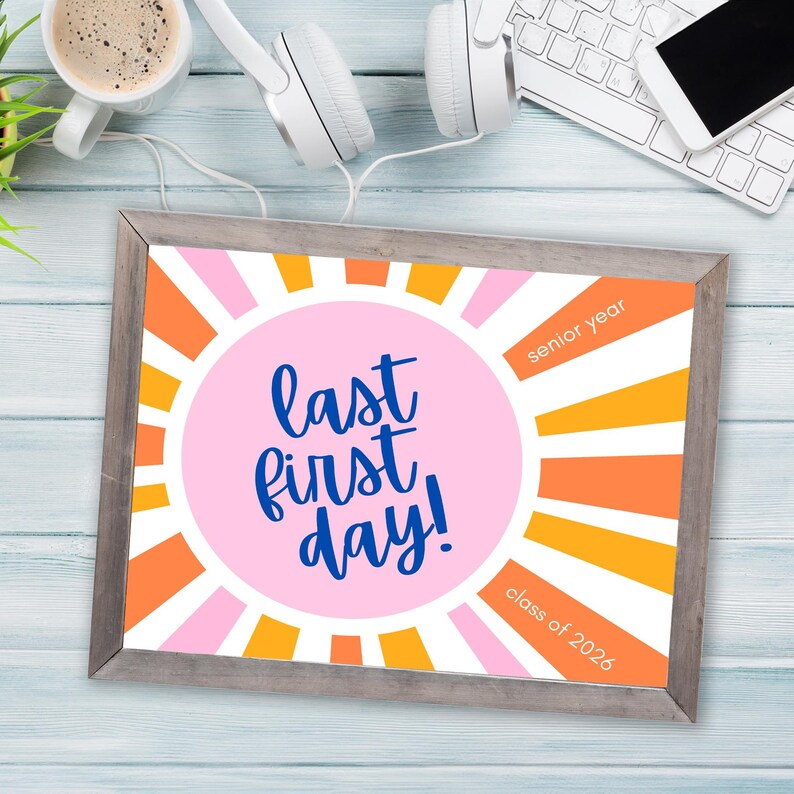 Framed Last first day sign or photo prop for the class of 2026 on a desk