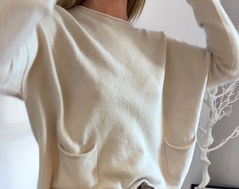 Pull crème doux avec poches