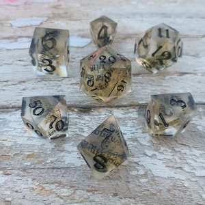 Set of 7 sharp edged polyhedral gaming book print newspaper reading literacy dice