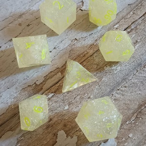 Set of 7 polyhedral sharp edged gaming dice stars glow black light