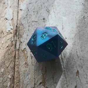 Single large chonk D20 dice galaxy space