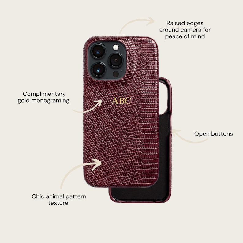 a burgundy-colored phone case with a unique animal-like texture, a gold monogram, and a raised edge around the camera for peace of mind.