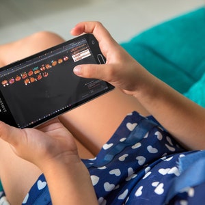 Pumpkin Emotes displayed on an android phone