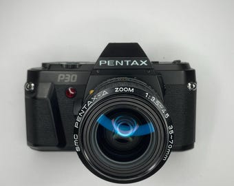 Pentax P30 35 mm SLR + Lente zoom Pentax-A 35-70 mm