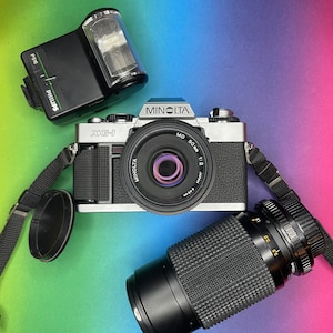 Minolta XG-1 35mm SLR Film Camera Set (Lenses, bag and flash)