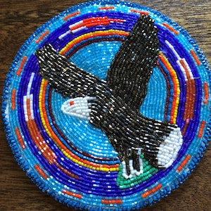 First Nations artists score big with beaded medallions and jersey design for Toronto Maple Leafs