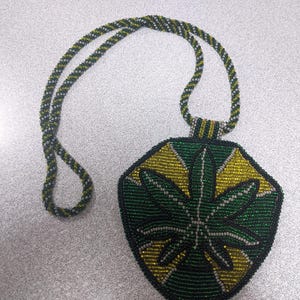 Beaded Leather Medallion.