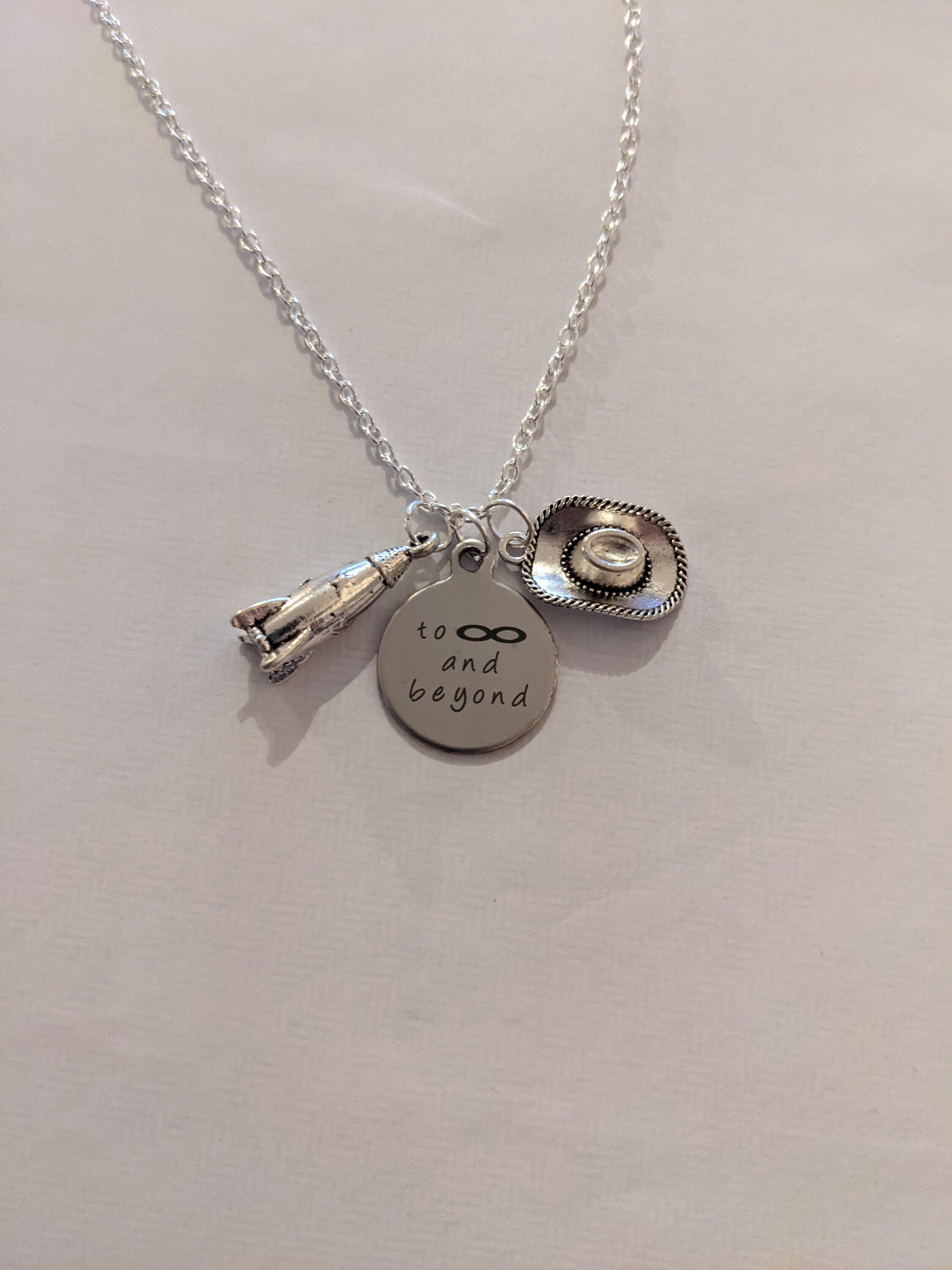 Disney to infinity hotsell and beyond necklace