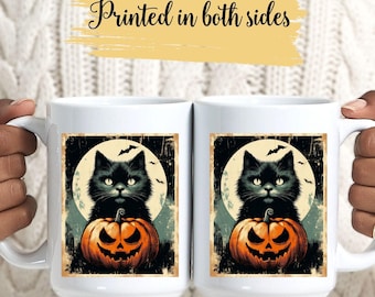 May include: Two white ceramic mugs with a Halloween design. Each mug features a black cat sitting in front of a full moon and a carved pumpkin. The mugs have the text "Printed in both sides".