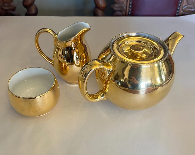 Featured listing image: Vintage Royal Worcester English 'Fireproof' gold lustre medium sized teapot, milk jug and sugar bowl set - 1960's collectable china