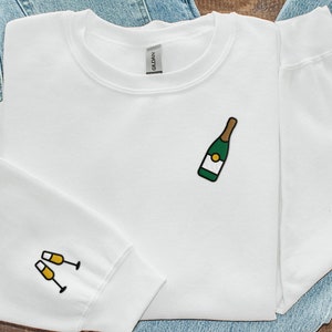 Champagne Embroidered Crewneck Sweatshirt, Cheers Sleeve Design