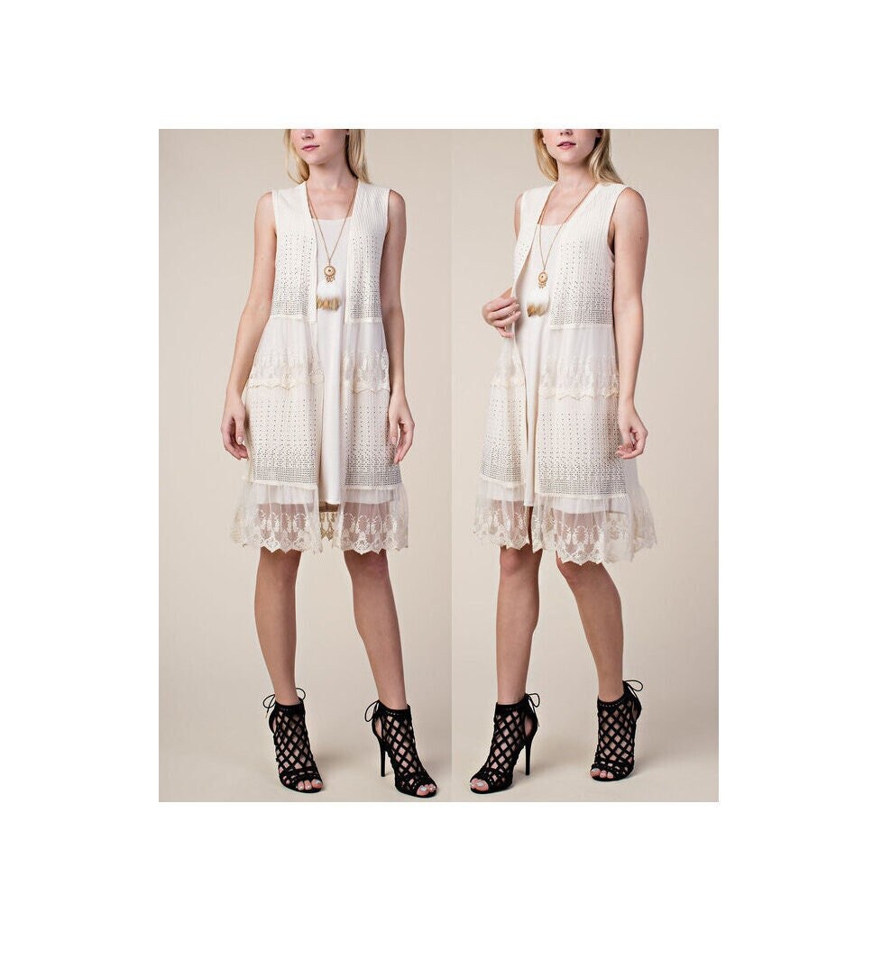 Long white shop sleeveless cardigan