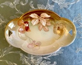 Antique RS (Reinhold Schlegelmilch) Germany oval serving tray (relish or celery dish). Fall leaves and dogwood flowers. 1912-1945.