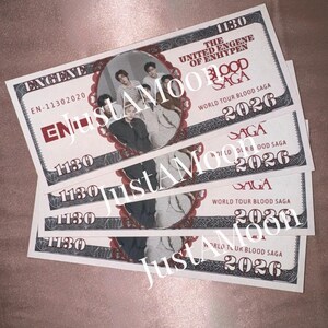 May include: A stack of rectangular paper tickets featuring a central oval frame containing a group photograph of seven individuals. The text reads THE UNITED ENGENE OF ENHYPEN, BLOOD SAGA, WORLD TOUR BLOOD SAGA 2026, and EN-11302020, with the word JustAMoon watermarked across the surface.