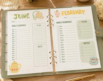 May include: A sage green ring-bound planner open to pages labeled June and February. Each page features a daily schedule from 6am to 9pm, a to-do list, and a notes section. The pages are decorated with illustrations of teapots, cups, and saucers.