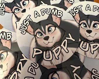 May include: A set of six round stickers featuring a cartoon husky puppy with blue eyes and a black and white fur pattern. The stickers have a white background with black text that reads "Just a Dumb Puppy".