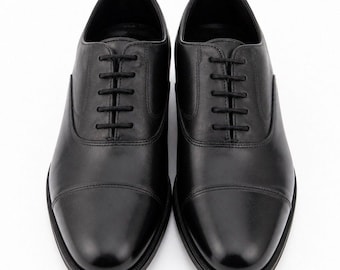 Zapatos Oxford Florsheim Imperials negros talla 10D (EE. UU.) con puntera reforzada.