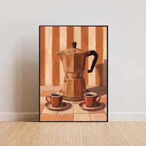 May include: A framed art print featuring a copper-colored stovetop espresso maker and two matching cups and saucers. The background has vertical stripes in shades of orange and cream. The artwork is a still life of coffee-related items.