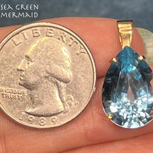 10k Yellow Gold 10 Ct Blue Topaz Teardrop Pendant