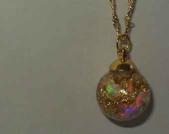 opal 14k gold flakes floating opal snow globe  floating like a miniature snow globe in glass gold filled chain