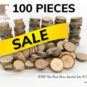 May include: A collection of 100 mini wood slices, assorted sets, with bark edges. The image features a yellow "SALE" banner across the wood slices. The text "Fairie Gifts" is visible in the upper left corner. The product is labeled "SCRAP Mini Wood Slices, Assorted Sets, 100 pcs".