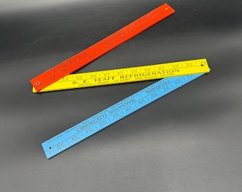 Regla plegable antigua de madera con publicidad de electrodomésticos y televisores de Texas (roja, amarilla y azul)