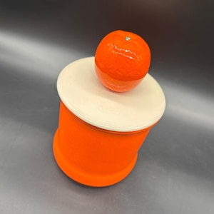 ヴィンテージオレンジキャニスターフルーツノブミッドセンチュリーキッチュUSAトロピカルストレージレトロ