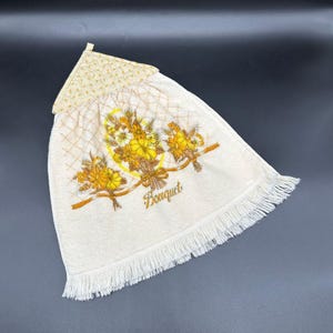 May include: A set of three ceramic mugs with a speckled, matte finish. The mugs are in shades of cream, light gray, and dark gray. Each mug has a simple, minimalist design, perfect for coffee or tea.