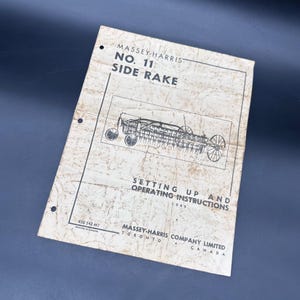 May include: Vintage Massey-Harris No. 11 Side Rake manual. The cover features the text "Massey-Harris No. 11 Side Rake" and "Setting Up and Operating Instructions 1949". The manual is printed in Canada.