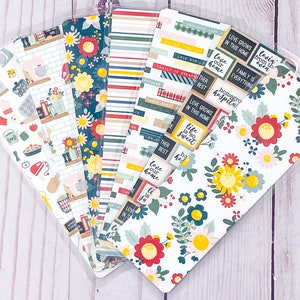 May include: A set of six colorful bookmark designs featuring floral patterns, stripes, and a kitchen theme. The bookmarks have text that reads "Love grows in this home", "Life is so sweet", "Home is our best", "Family is everything", "Love our home", and "Homegrown hospital".