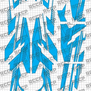 May include: A collection of blue vinyl cut graphics for a vehicle, featuring various shapes and designs. The pieces are arranged on a grid background, with labels like "TRUNK" and "HOOD". The graphics have white accent lines.