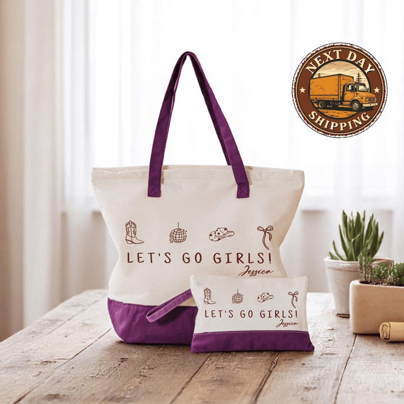 a white and purple bag sitting on top of a wooden table