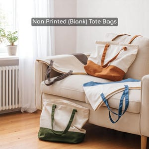 a white couch with a bag on top of it