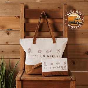 a white bag sitting on top of a wooden chair