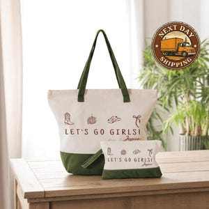 a white and green bag sitting on top of a wooden table