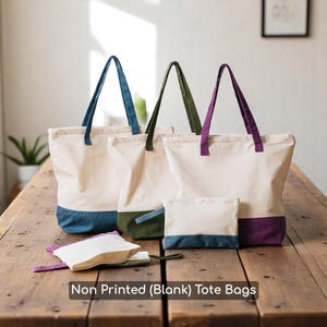 two canvas bags sitting on top of a wooden table