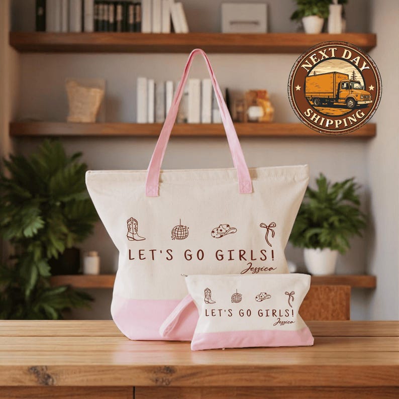 a pink and white bag sitting on top of a wooden table