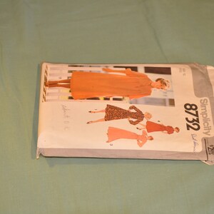 May include: A Simplicity sewing pattern envelope for a dress, featuring three different styles. The pattern number is 8732 and the price is $2.00.