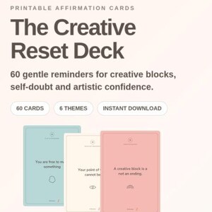 May include: Printable affirmation cards titled The Creative Reset Deck, featuring 60 gentle reminders for creative blocks, self-doubt, and artistic confidence. Includes 60 cards, 6 themes, and instant download. Three cards in light blue, cream, and pink are shown.