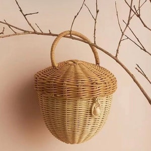 Cabilock Rattan Woven Basket Handmade Acorn Shaped Basket Wall Hanging  Basket Shoulder Crossbody Bas…See more Cabilock Rattan Woven Basket  Handmade