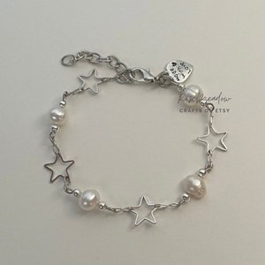Pulsera de estrellas y perlas