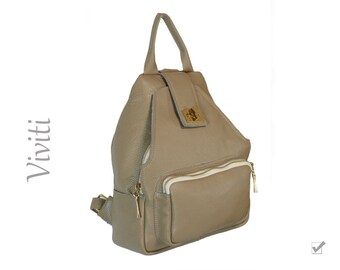 Beige genuine leather backpack.