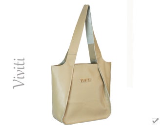 Borsa a mano in vera pelle beige.