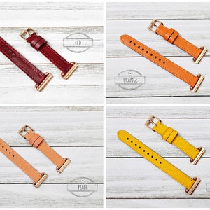 May include: Four leather watch straps in red, orange, peach, and yellow. Each strap has a gold-coloured buckle and connector. The words "RED", "ORANGE", "PEACH", and "YELLOW" are printed on the image.