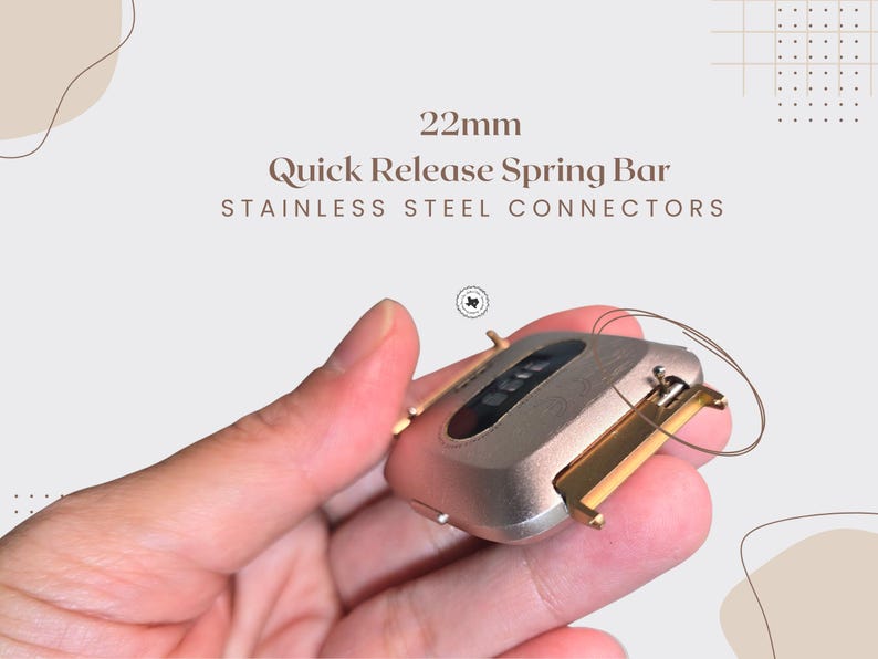 Puede incluir: Primer plano de una barra de resorte de liberaci&oacute;n r&aacute;pida de 22 mm con conectores de acero inoxidable. El componente del reloj es de color oro y plata. El texto "22mm Quick Release Spring Bar Stainless Steel Connectors" es visible.